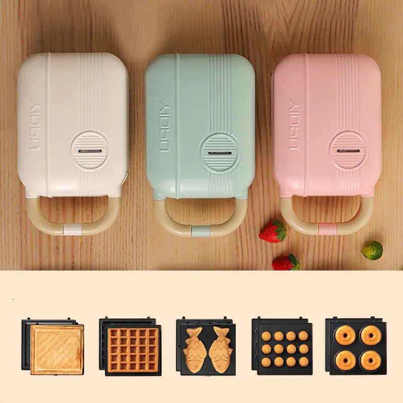 Living Abroad Creations Breakfast Maker with small fish, muffin, sandwich, doughnuts and waffle plates