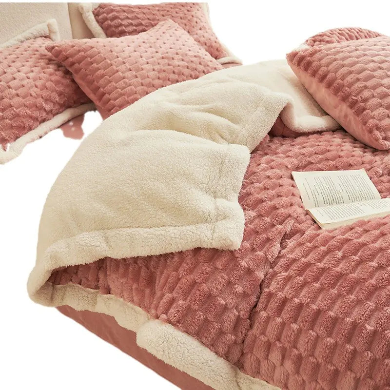 Premium 4-piece fleece bedding set folded neatly on a bed in Bean Paste Pink