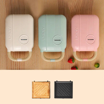 Compact and sleek 3-in-1 Breakfast Maker in white, pink and green -  perfect for small kitchens