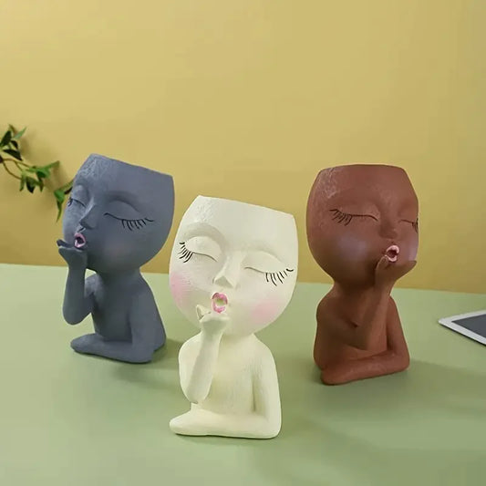 Flying Kiss Girl Resin Flower Pot by Living Abroad Creations
