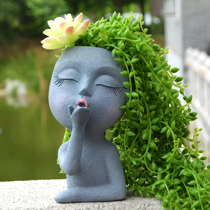 Grey resin girl head flower pot with kiss detail – Living Abroad Creations