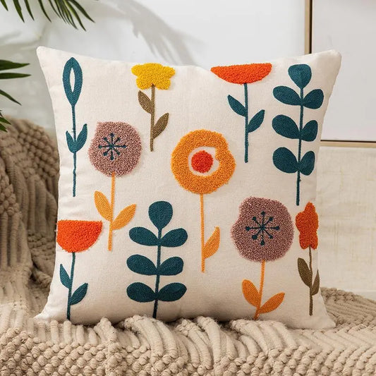 Living Abroad Creations Nordic embroidered floral pillow on modern beige sofa