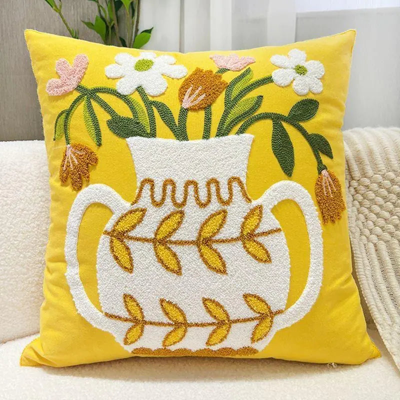 Living Abroad Creations embroidered throw pillow with flowers in a vase
