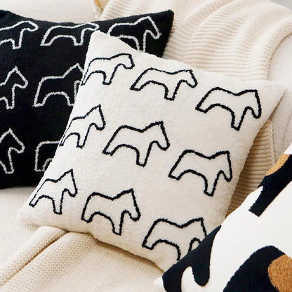 Living Abroad Creations nordic pillow cover detail showing threadwork of ponies