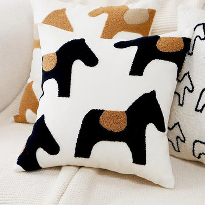 Living Abroad Creations stacked boho embroidered pony pillows 