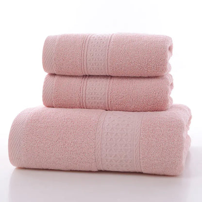 Plush pink bath towels with elegant finish by Living Abroad Creations